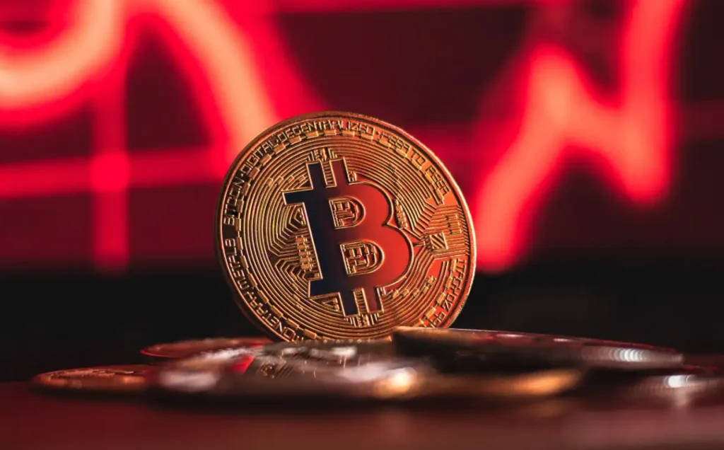 Bitcoin Drops Under $77,000 After Jim Cramer Predicts Rally